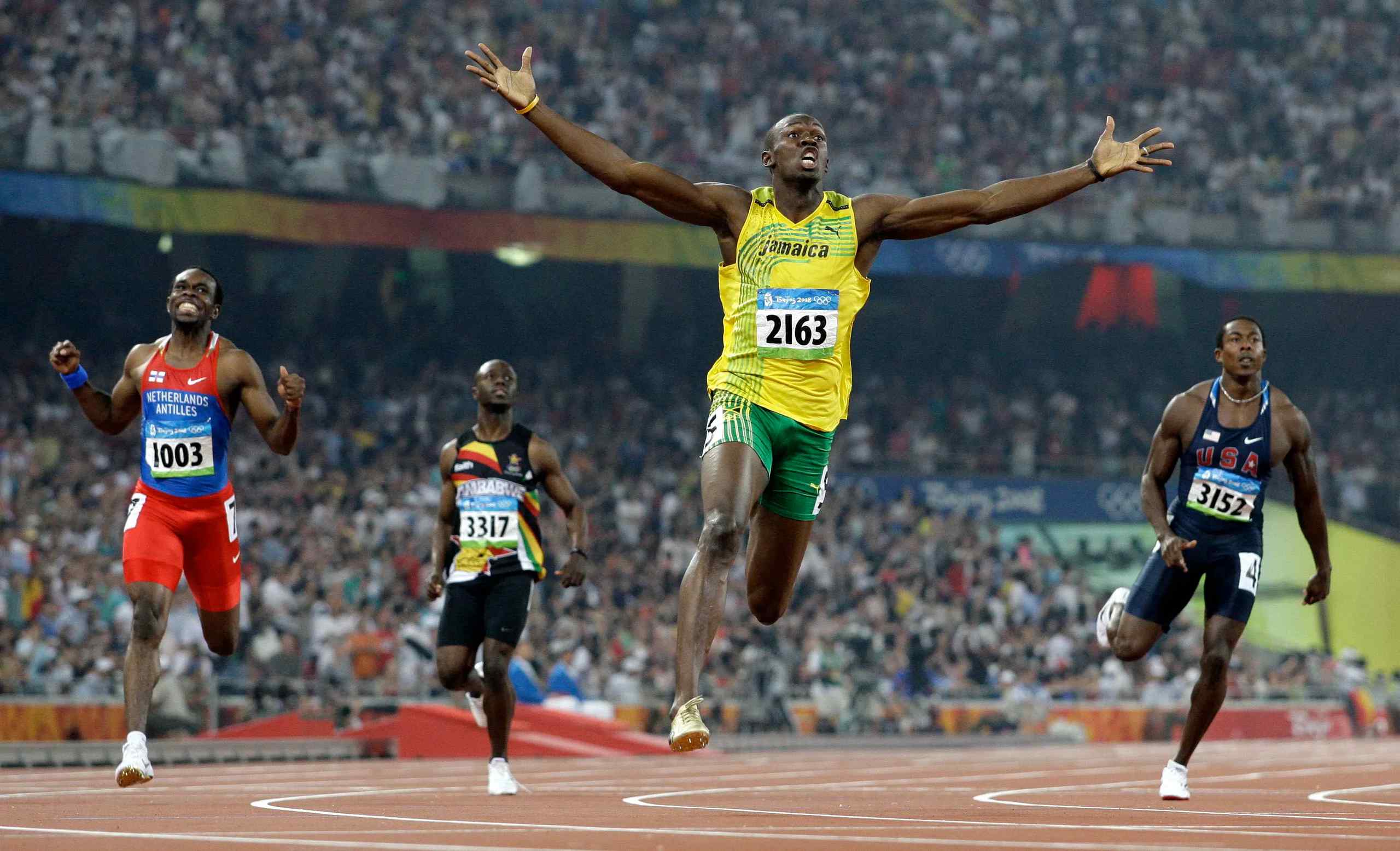 Usain Bolt celebrating another victory.